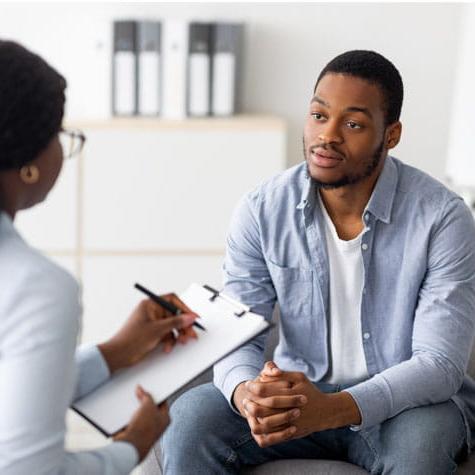 Black male patient in consultation